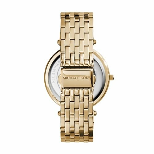 Montre dorée vue de dos