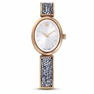 Montre de luxe pour femmes avec bracelet en cristaux et boîtier doré.