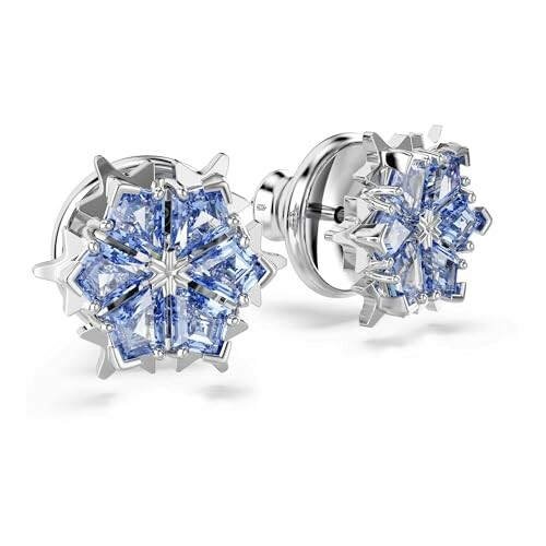 Boucles d'oreilles argentées avec pierres bleues en forme d'étoile.