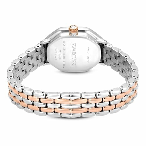 Montre Swarovski vue de dos avec bracelet en métal argenté et doré.